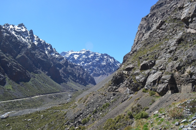 Photo of old rail grade and newer road, plus mountains